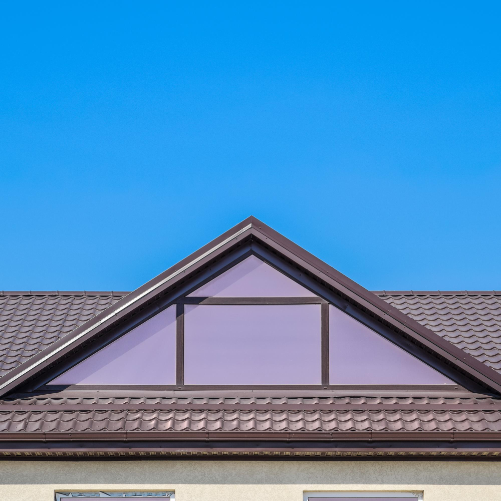 Toiture tuiles brunes maison